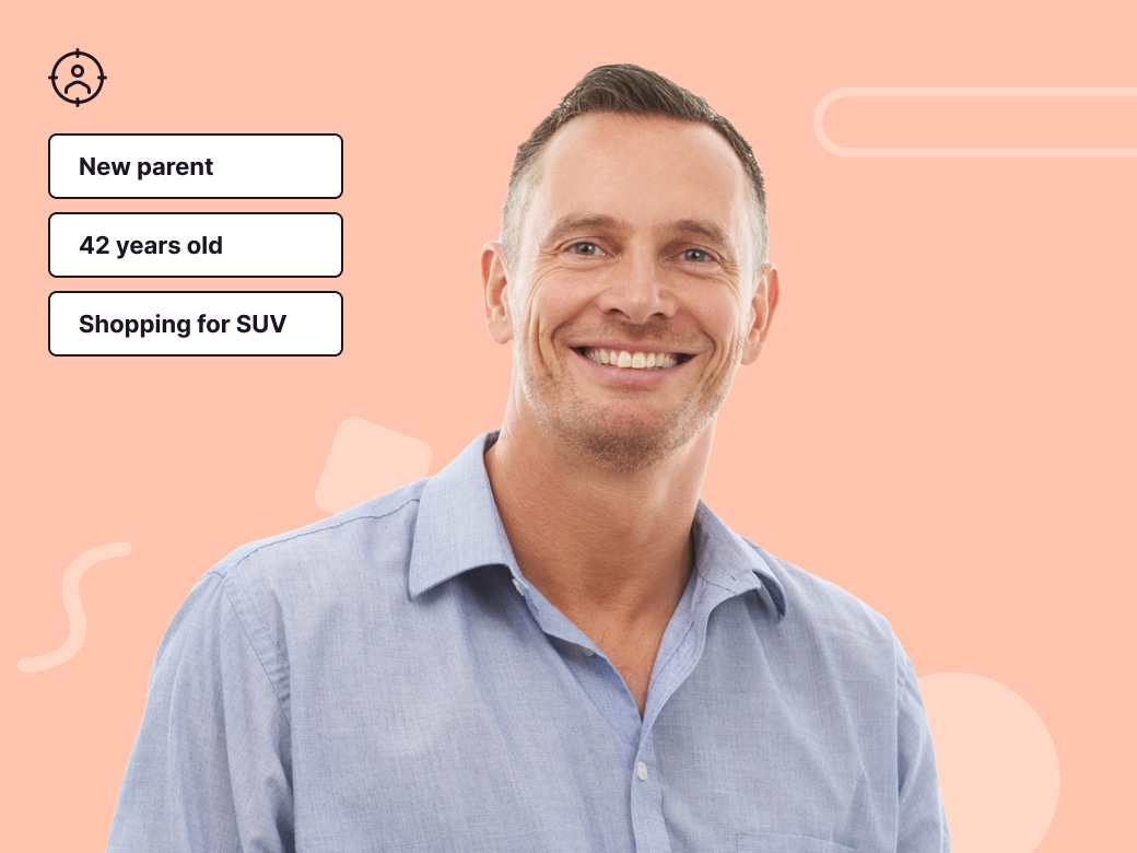 Photo of a smiling person looking at the camera. To the left of the person, there are data attributes/tags which are "New parent", "42 years old", and "Shopping for SUV".